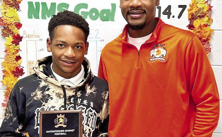 Blessed Brown of Natchitoces Maganet proves that you can excel both on the field and in the classroom. This incredible student-athlete was awarded MVP for his outstanding performance on the football field this season. Brown led the team in scoring, with a 5touchdown game that had everyone cheering. Pictured from the left are Brown and principal Antavious Roberson.