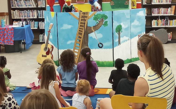 Sock puppets entertained the kids at the Summer Reading Program.