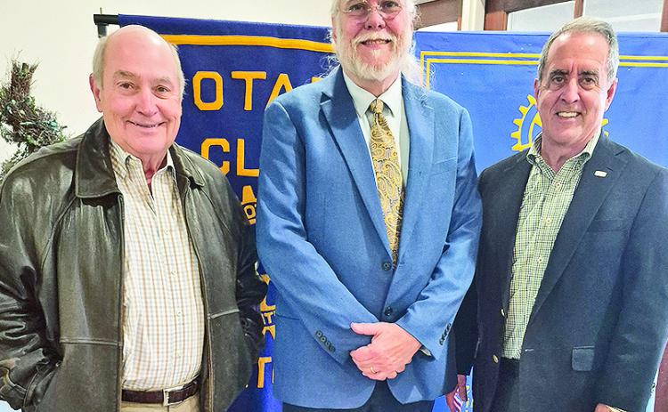 Rotary President Louie Bernard welcomed Dr. Greg Granger at the Jan. 20 luncheon at Merci Beaucoup. Granger spoke about the state of the world in 2026. From left are Ron Corkern, Granger and Bernard.