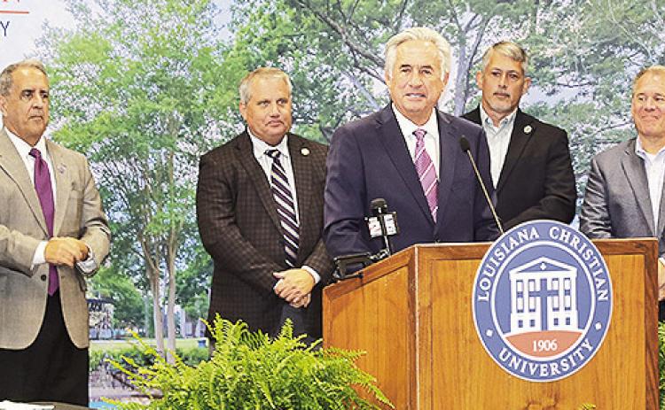 NSU President James Genovese was introduced to leaders in business, education and healthcare during a meeting of the North Rapides Business and Industry Alliance Monday. Joining him were supporters, from left former State Sen. Gerald Long, State Rep. Michael T. Johnson, former State Sen. Louie Bernard, State Rep. Jason DeWitt, State Rept. Gabe Firment and State Sen. Alan Seabaugh. Seated are fellow speakers Rapides Parish Superintendent of Schools Jeff Powell and Louisiana Surgeon General Dr. Ralph Abraham.