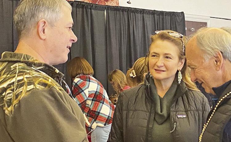 District 22 State Representative Gabe Firment, Laura Seabaugh, wife of District 31 State Senator Alan Seabaugh, and retired City of Natchitoches Community Development Director Randy LaCaze chat while enjoying dessert and libations following the Christmas Parade.