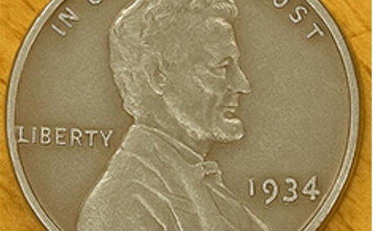 Columnist John Moore has collected pennies all of his life. Including this 1934 Lincoln wheat penny. He’ll miss the penny when it’s gone.