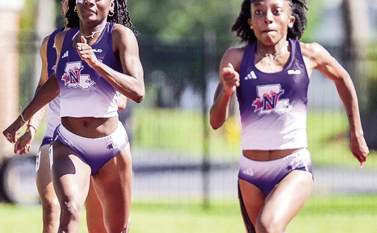 Tranasia Jones (center) and Samari Finney are half of the 4x400 women’s relay team that ranks first in the Southland Conference and coming off a strong showing at the Lurline Hamilton Invitational this past weekend. Photo by Chris Reich, NSU Photographic Services