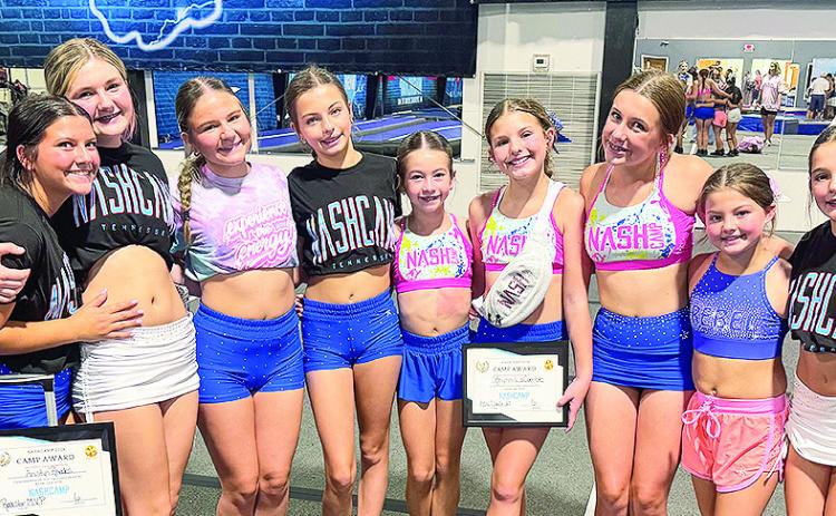 Natchitoches Flipping Athletics (NFA) attended Nash Camp in Nashville, TN with over 100 other athletes from all over the world. Campers learned new skills, made new friends and took home some awards proving small town girls can always dream big. From left are Anistyn Rhodes, Camper of the Week, Xoe Lester, Handstand Finalist, Madi Trichel, Nora Pinder, Thea Foshee, Handstand Finalist, Rhynn Lacombe, Dance Camp Winner, Jolee Shea, Chant Off Winner, Fallan Pinder, and Milleigh Aton, Group Dance Winner.