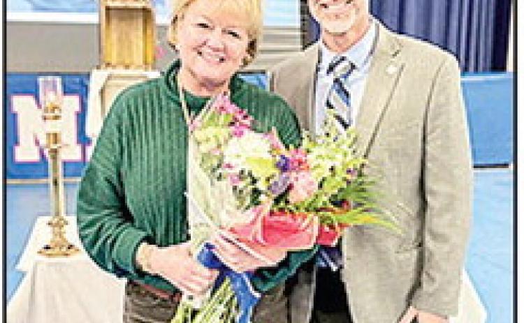 St. Mary’s Catholic School Principal Steven Wren presented the Em W. Knipmeyer Excellence in Teaching Award to Kelly Savell.
