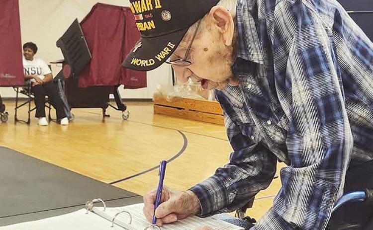 Clerk of Court David Stamey provided this photo of Raymond Cedars, 100,voting in person June 27 at Weaver Elementary School. Commissioner in Charge DeeDee Dunagan and the Elections Commissioners staff welcome Cedars. “If our turnout is less than acceptable, we will not blame Mr. Cedars,” Stamey said. “Thanks Mr. Raymond for showing up and showing Natchitoches Parish what makes a great American.”