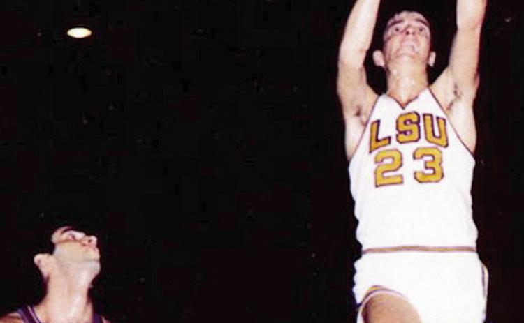 “Pistol” Pete Maravich scoring two of his 3,667 points with the LSU Tigers against the Florida Gators. Photo by John Musemeche.