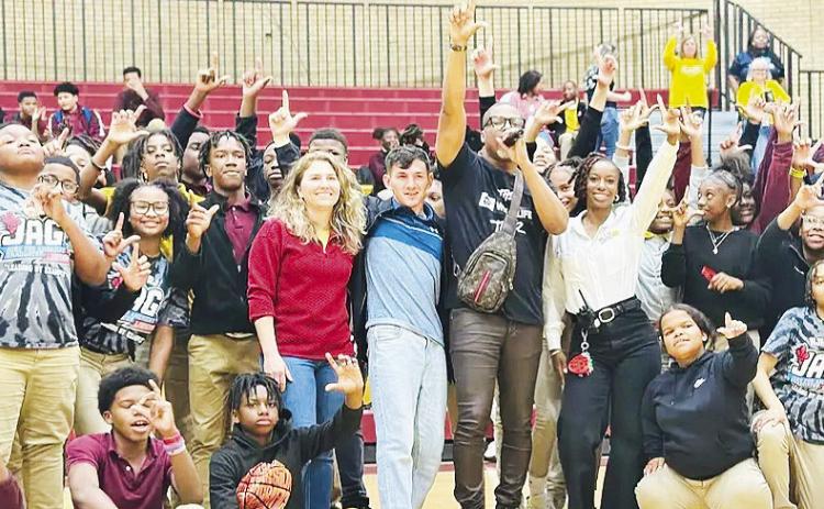 Motivational speaker talks to JAG member