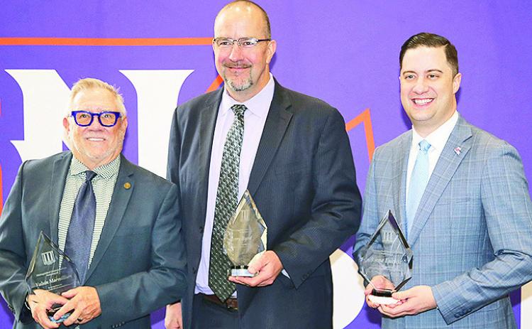 Northwestern State honored three alumni, the late Jerry Byrd Sr., Lane Luckie and Valsin Marmillion, as 2025 Distinguished Communications Professionals during a lunch and awards program April 4. From left are Marmillion, Jerry Byrd Jr. and Luckie.
