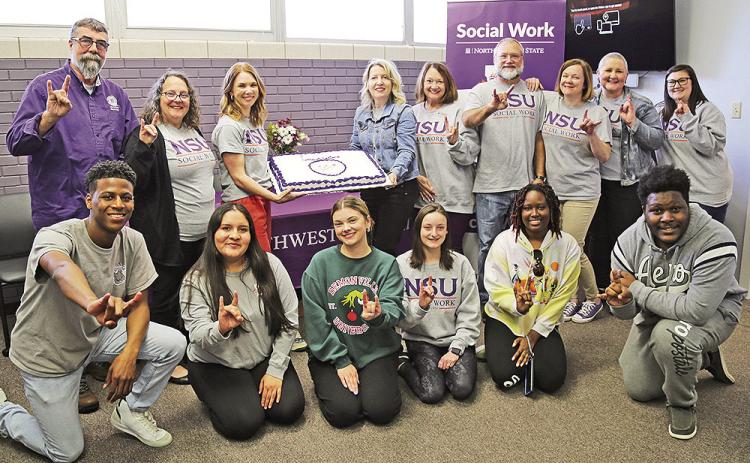 Students, faculty and staff from NSU’s Department of Social Work celebrated reaccreditation by the Council on Social Work Education. Kneeling from left are Social Work Club members Coree Nash, Atziary Perez, Audrey Wiggins, Kaci Green, LaShaun Bolden and Terry Williams. Faculty and staff on back row are Byron McKinney, Lisa Mount, Kirby Peddy, Susan Campbell, Denise Bailey, Randy Hoffpauir, Jennifer Shaw, Jessica Fultz and Morgan Durr.
