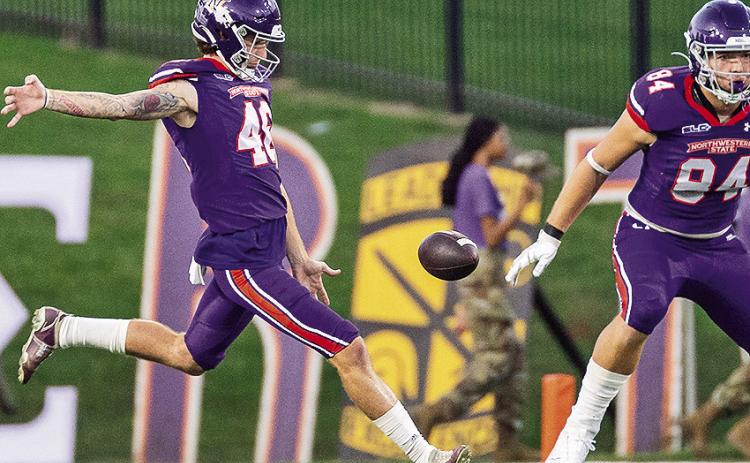 Scotty Roblow punts against Weber State in September. Photo by Chris Reich/NSU Photographic Services