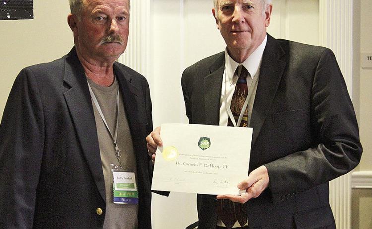 Pictured at right is Natural Resources professor Cornelis De Hoop.