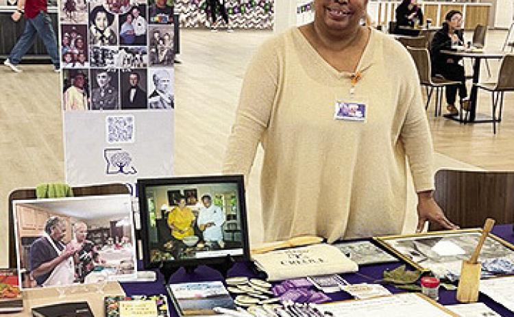 Kelly Jackson represents the Creole Heritage Center in sharing information about the CHC.