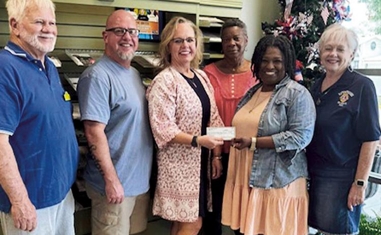 Natchitoches Lions Club recently made a donation to the Natchitoches Parish Council on Aging’s Annual Fan Drive. Left to right are Lions Bill Buckley, Sammy Woods, Nicole Connell, COA Outreach Patrice Parker. COA Clerk Linda Franklin, and Lion Mimi Stoker.