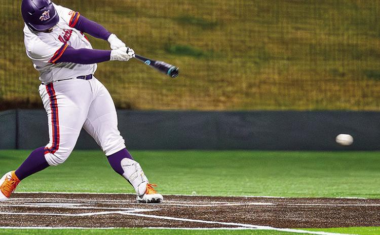 Braden Benton drove in the Demons’ first run in Sunday’s loss to No. 24 Troy. Photo by: Chris Reich/NSU Photographic Services