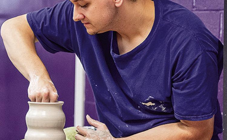 Potter Brandon Cagle at work