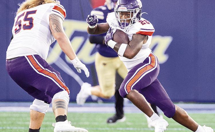 Ray Mckneely-Harris (center) runs upfield during the Aug. 29 game at Tulsa. Credit: Chris Reich/NSU Photographic Services