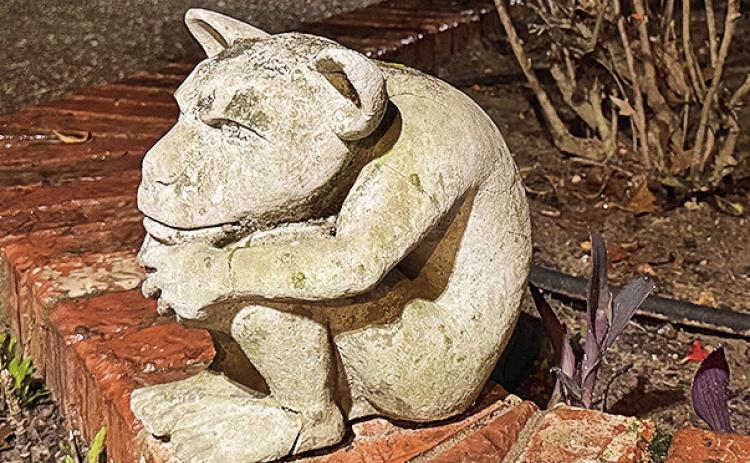 Columnist John Moore grew up with yard art, and still proudly displays a concrete gargoyle out on the front porch.