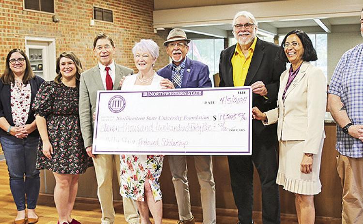 Friends, former students and colleagues presented a check in the amount of $11,245 to the NSU Foundation for the Dr. Holly Stave Endowed Scholarship. From left are Dr. Alexei Muravitsky, Dr. Nicole Lobdell, Lauren Michel, Dr. Richard Jensen, Stave, her husband Richard Pool, Dr. Greg Granger, Dr. Neeru Deep and Dr. Mark Melder.