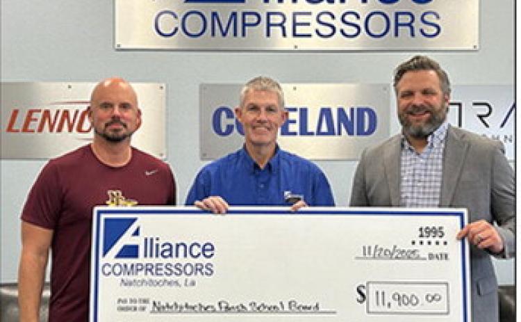 Alliance Compressors donated $11,900 to the Natchitoches School Board to be distributed to the various school organizations within the parish. From left are Teacher/Coach Assistant at NCHS Jordan Dupuy, Plant Manager Brian Brock and Superintendent Dr. Grant Eloi.