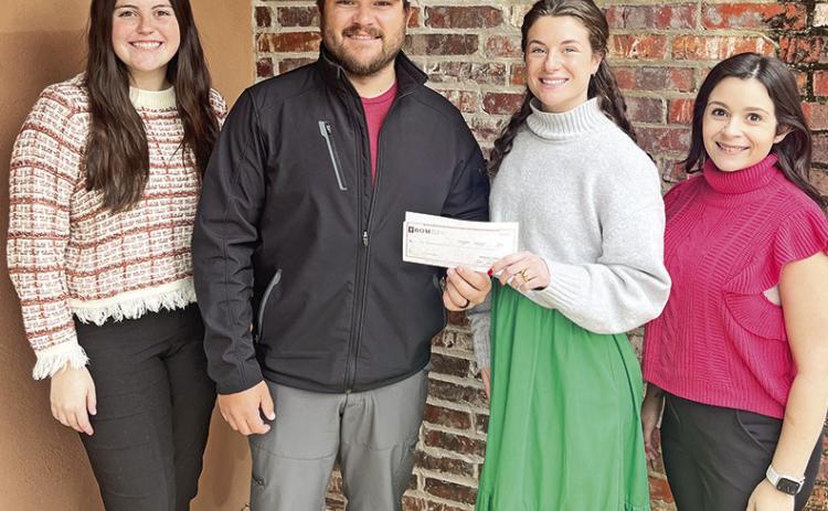 BOM continues it sponsorship of Justin Cooper Fishing. Pictured from left is BOM’s Zoe Johnson, Justin Cooper and, BOM’s Mary Scruggs and Kessler Barnes.