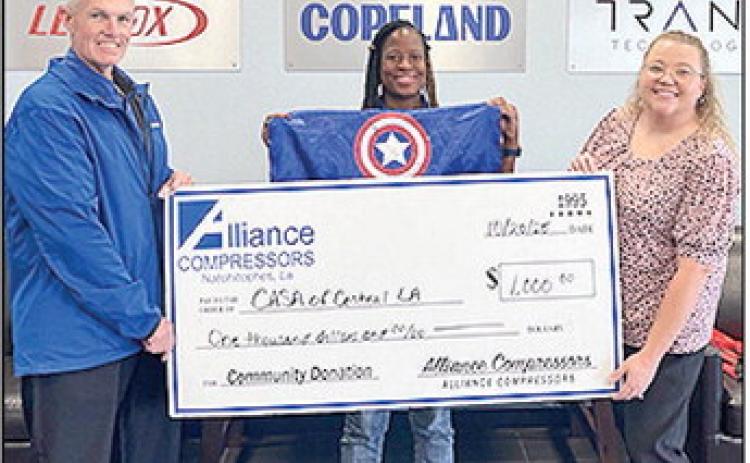 Alliance Compressors donates $1,000 to CASA of Central Louisiana for the Superhero 5K run on Nov. 1. Pictured from left are Brian Brock (Plant Manager, Alliance Compressors), Venecia Newton (Human Resources, Alliance Compressors) and Emily Dahl (Executive Director).