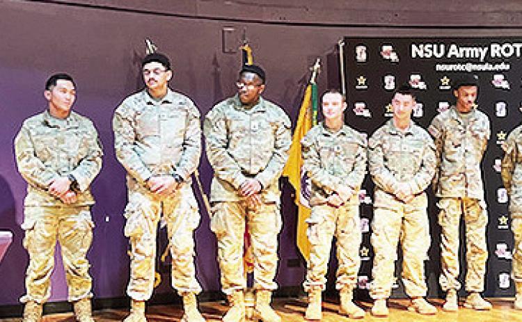Graduating NSU ROTC cadets who were commissioned on Dec. 18 learned their branch assignments during the awards program. From left are Jan Amutan, Jaylon James, Damarkus Lawson, Todd Gladish, Ethan Jones, Christian Holmes, Layla Theriot and Lawson Turner.