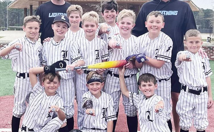 USSSA Easton Hype 10U Champions under head coach Donovan Ohnoutka and assistant Coach Luke Mahloch. Front row from left are Cohen Gandy, Callen Bertrand and Carter Hough. Back row from are Carson Gentry, Luke Fair, Ryne Williams, Coach Ohnoutka, Adam Todtenbier, Murphy Linebaugh, Jax Errington, Liam Mahloch, Coach Mahloch and Archer Johnson.