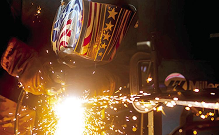 Air Force Tech. Sgt. Cameron Gibbs practices plasma cutting at Rickenbacker Air National Guard Base in Columbus, Ohio, June 26, 2025. Photo by Air Force Airman Taylor Warehime, Air National Guard