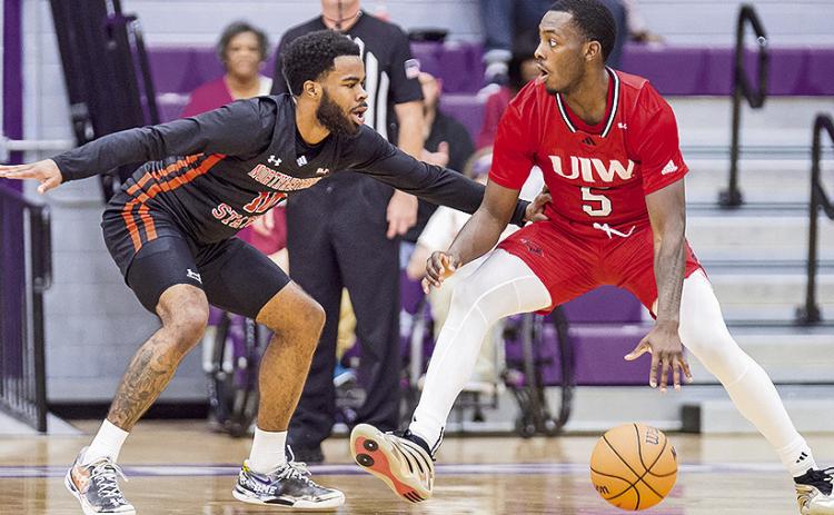 Jon Sanders II (left) and Northwestern State carry a season-long, fourgame win streak into Monday’s Southland Conference Tournament quarterfinal game. Photo by Chris Reich/NSU Photographic Services