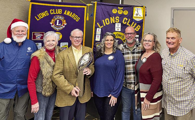 From left are Lions Bill Buckley, Mimi Stoker, Louisiana Sports Hall of Fame Foundation Director of Business Development and Public Relations Greg Burke, Lions Sarah Giannone, Sammy Woods, Nicole Connell and Jerry Silman.
