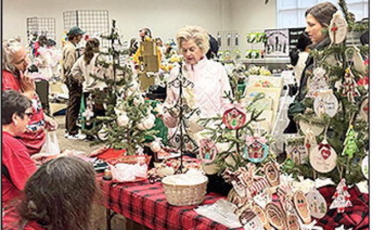 Scores of shoppers visited the Fleur deLis Arts and Crafts Show Nov. 29 that featured over 100 booths of handmade items by artisans and craftsmen from throughout the region.