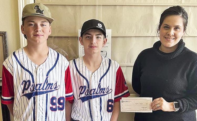 BOM Bank is proud to support the Psalms Christian Academy baseball team. Baseball is more than just a game—it’s about building character, learning teamwork, and developing discipline both on and off the field. BOM loves seeing t young athletes grow into strong leaders through the sport they love. From left are Ethan Stiles, AJ Procell and BOM’s Chelsea May.