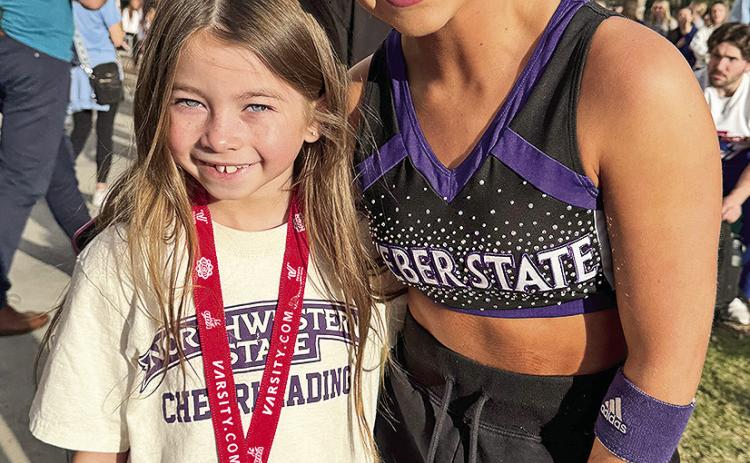 Thea Foshee of Natchitoches meets coach Hailey Smith.