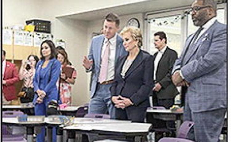 U.S. Department of Education Secretary Linda McMahon tours a Baton Rouge school, joined by State Superintendent Cade Brumley (left) and Rep. Troy Carter, R-La. (right).
