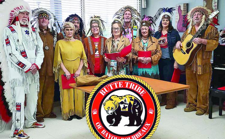 Members of the Butte Tribe of Bayou Bourbeaux bring the joy of the Christmas season to the joy to the elders and disabled of their community at the Natchitoches Nursing and Rehabilitation Center.