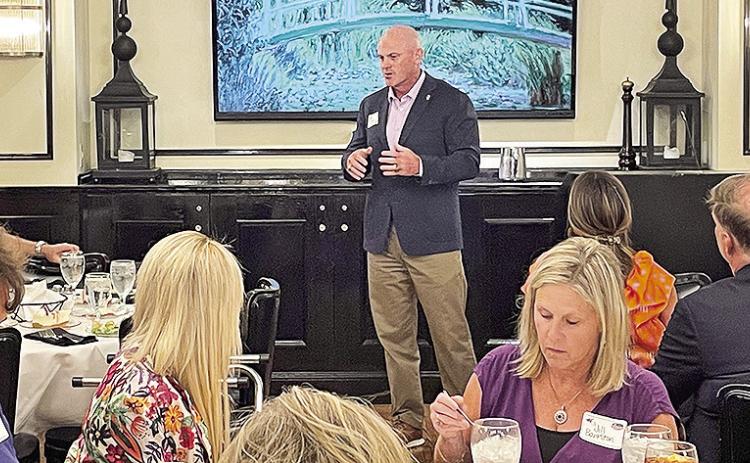 Northwestern State head coach Blaine McCorkle (center) speaks during Thursday’s Northwestern State/Independence Bowl Kickoff Luncheon in Shreveport. Photo by Jason Pugh/NSU Sports Information