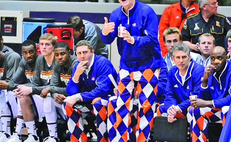 Playing surface at Parther Coliseum will be named in honor of Mike McConathy, standing.