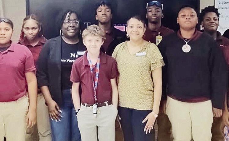 Pictured are Jazmine Moore, Marcus Conday. Lakayla Jones, Iris Lilly, Advocate Supervisor, Mitchell Bayonne, Joey Carpenter, Chrishelle Washington, Advocate Supervisor, Kyren Burton, Shurmichael Moore, Darrien Elmore, Randall Carter, Heriberto Cabrera-Mendez and Cameron Thibodeaux.