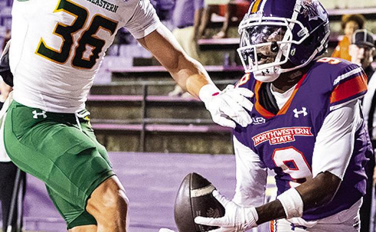 Camryn Davis (right) makes one of his two touchdown catches against Southeastern Louisiana. Photo by Chris Reich, NSU Photographic Services