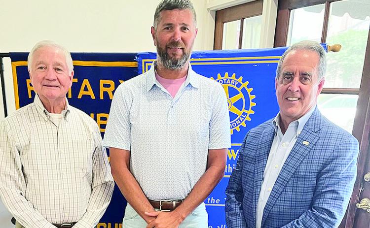 Rotarian Richard Guidroz welcomed the Director of the Cane River Waterway Jason Adcock at the May 12 meeting. Adcock shared information about the pump station, the vegetation and safety on the river. From left are Guidroz, Adcock and Rotary President Louie Bernard.