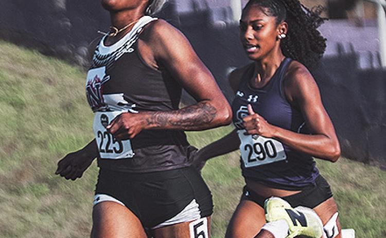Rushana Dwyer is at left.