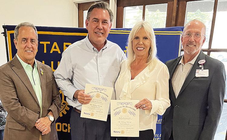 Rotarian Kirk Soileau welcomed new members John and Kathy Richmond. From left are Rotary President Louie Bernard, John Richmond, Kathy Richmond and Soileau.
