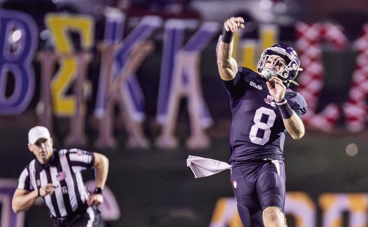 NSU quarterback Tyler Vander Waal uncorks a 29-yard touchdown pass to Stanley King on Thursday night. Photo by Chris Reich/NSU Photographic Services