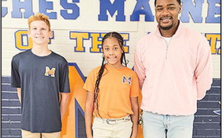 Natchitoches Magnet School announces its 5th and 8th grade Student of the Year Finalist. The 8th grade Student of the Year is Josiah Harris and the 5th Grade Student of the Year is Des’Lyn Peace. The two will compete for Natchitoches Parish Student of the Year. Pictured from left are Harris, Peace and Principal Antavious Roberson.