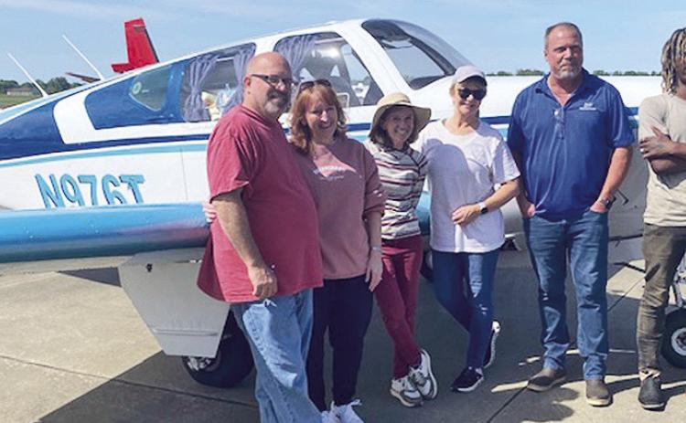 Sibling pups fly to new homes in The Hamptons
