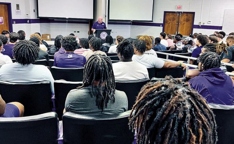Head coach Blaine McCorkle addresses the Northwestern State football team during Monday’s report day. Photo by Brad Welborn/NSU Sports Information
