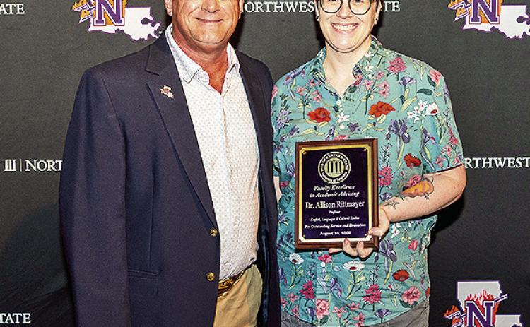 Dr. Allison Rittmayer, right, was honored for Excellence in Academic Advising. The award was presented by Steve Hicks, executive director of Academic Engagement and Student Success.