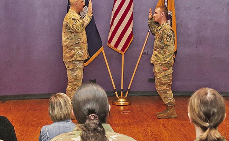 Cadet Todd Gladish also took his Oath of Enlistment during ROTC Awards program, administered by LTC Josh Drake.
