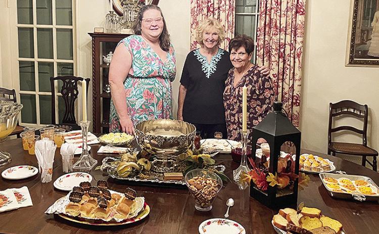 Hostesses for the Lesche meeting in November were, from left, Donna Baker, Stephanie Kautz and Rosemary Troquille.